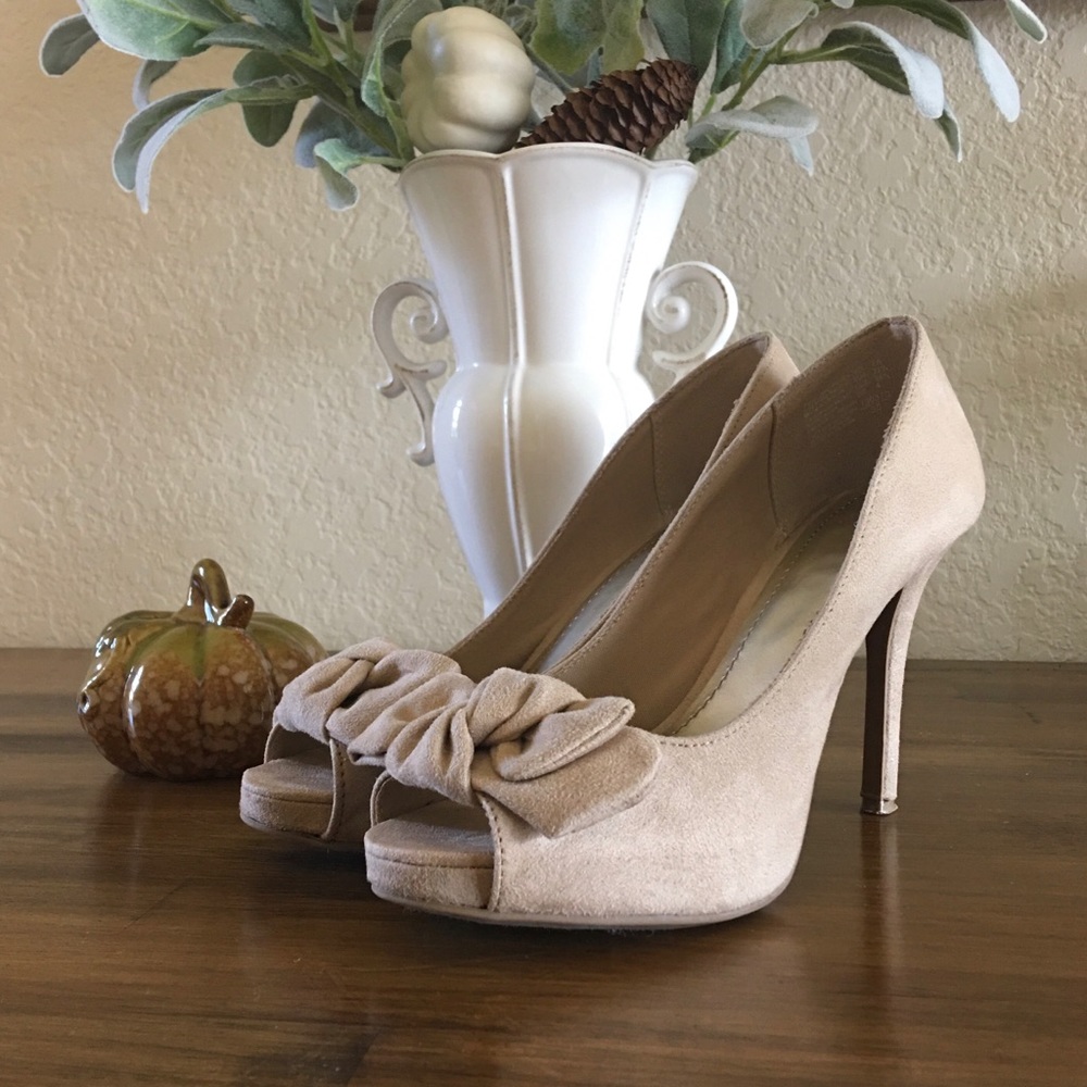 Nude Suede peep toe bow accented heels